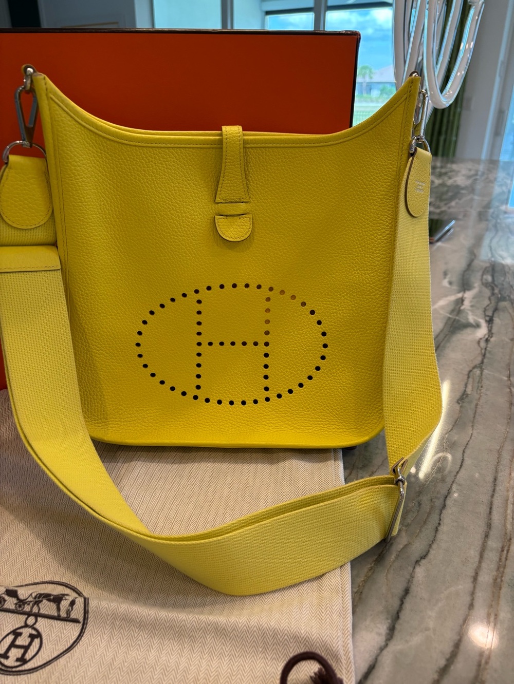 Hermes' Evelyne lll Crossbody Bag in Lime